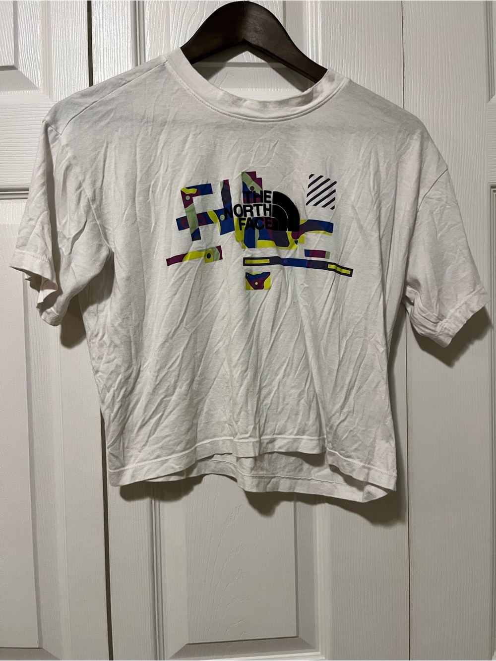 The North Face White Tee with Multicolor Abstract Logo